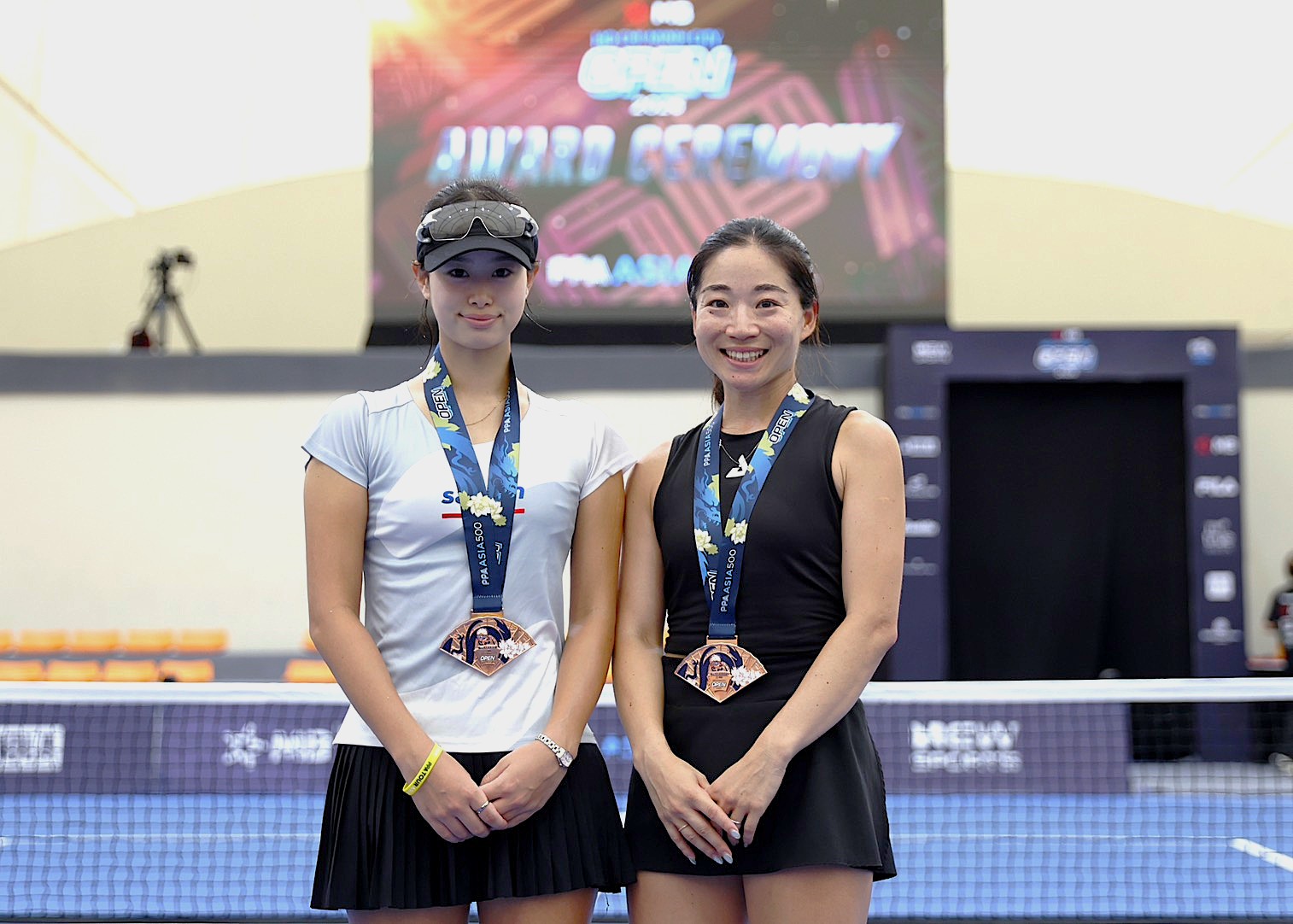 PPA Asia 500 MB Ho Chi Minh City Open 2026 — Women's Doubles: Kei Sawaki & Aiko Yoshitomi high-five after a point